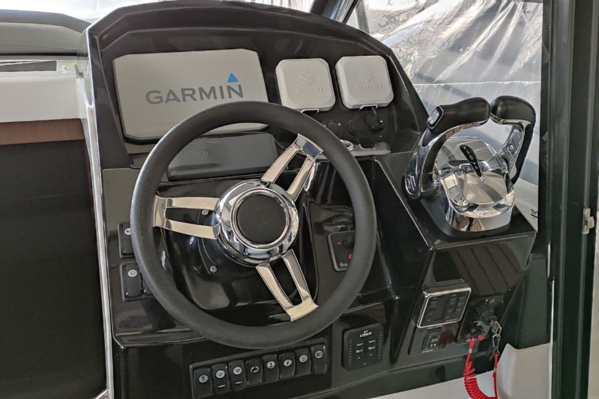 Cockpit of Gloria, a Jeanneau Merry Fisher 895 motorboat at Bacoli, Italy