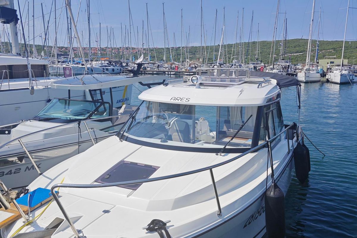 Exterior view of Ares, a Jeanneau Merry Fisher 795 Series 2 motorboat at Punat, Croatia