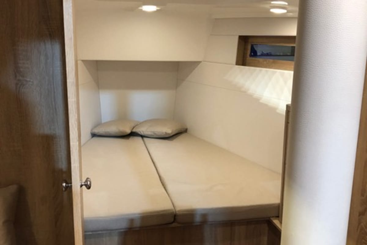 Cabin on Guttiau, a Viko S 35 sailboat at Poltu Quatu, Italy