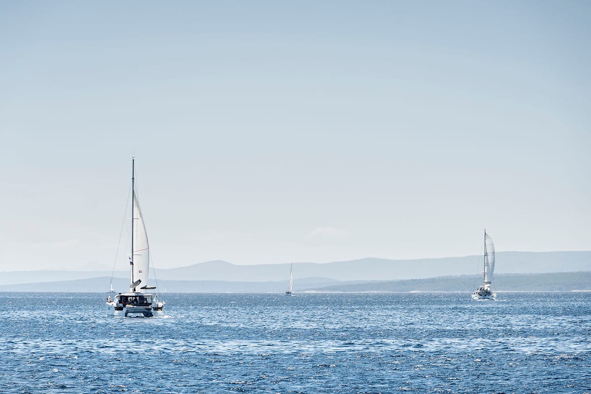 Exterior view of Emerald Gemini, a Lagoon 52 F OW catamaran at Grad Kaštela, Croatia