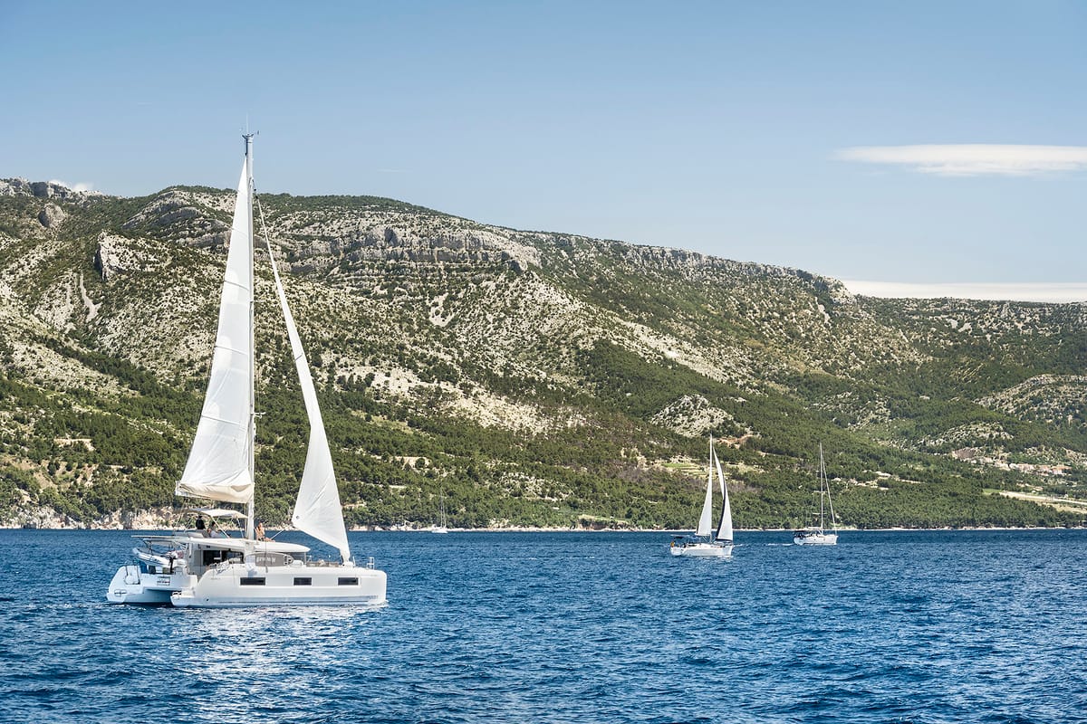 Exterior view of Emerald Gemini, a Lagoon 52 F OW catamaran at Grad Kaštela, Croatia