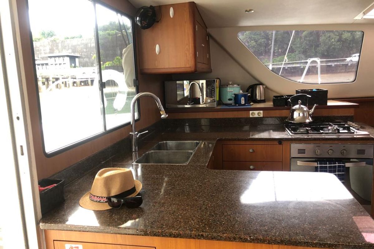 Galley of Kirsty B, a Custom Made Matrix Vision 450 catamaran at Mai Khao, Thailand