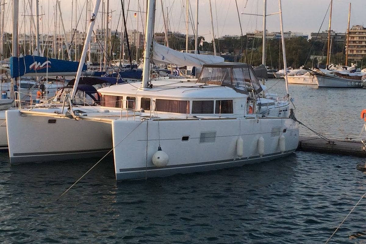 Exterior view of Emerald Seas, a Lagoon 400 S2 catamaran at Lavreotiki Municipal Unit, Greece