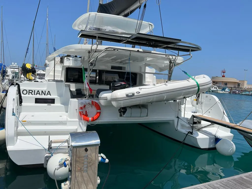 Exterior view of Oriana, a Lagoon 46 Fly catamaran at Capo d'Orlando, Italy