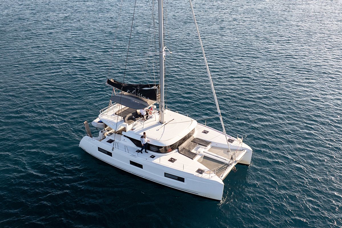 Exterior view of Kalisi Mou, a Lagoon 46 catamaran at Parikia, Greece