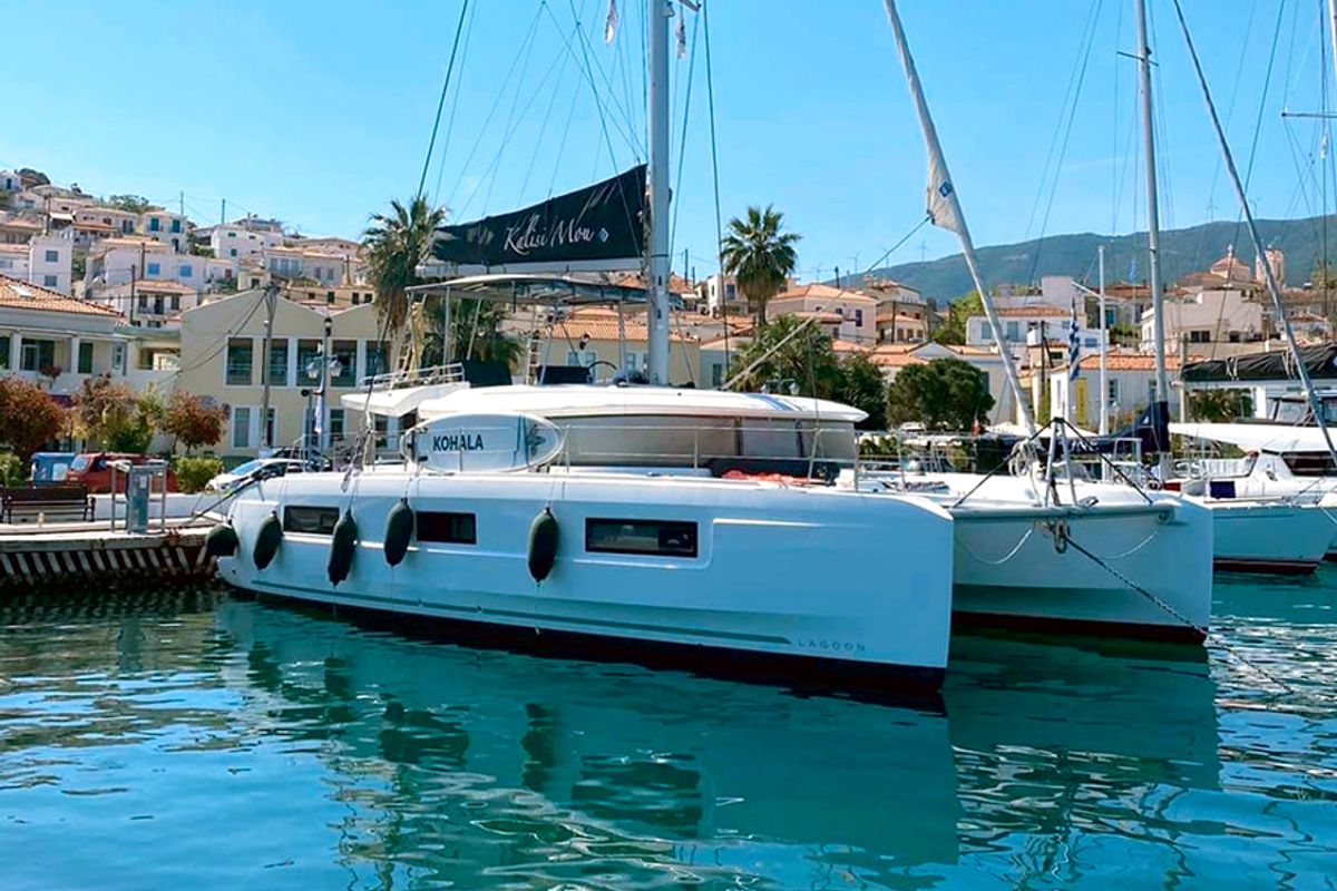 Exterior view of Kalisi Mou, a Lagoon 46 catamaran at Parikia, Greece