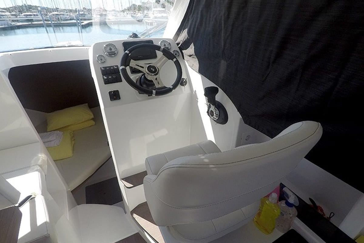 Cockpit of Lovre, a Beneteau Antares 8 OB motorboat at Grad Šibenik, Croatia