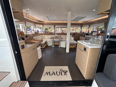 Salon of MAUI (PTP), a Lagoon 55 catamaran at Le Gosier, France