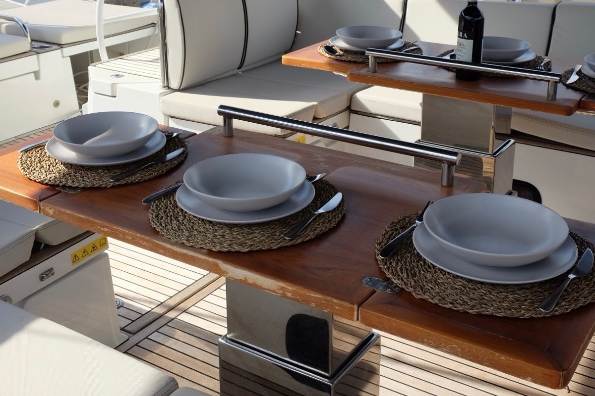 Deck of Premium +, a Beneteau Oceanis Yacht 62 sailboat at Rosignano Solvay, Italy