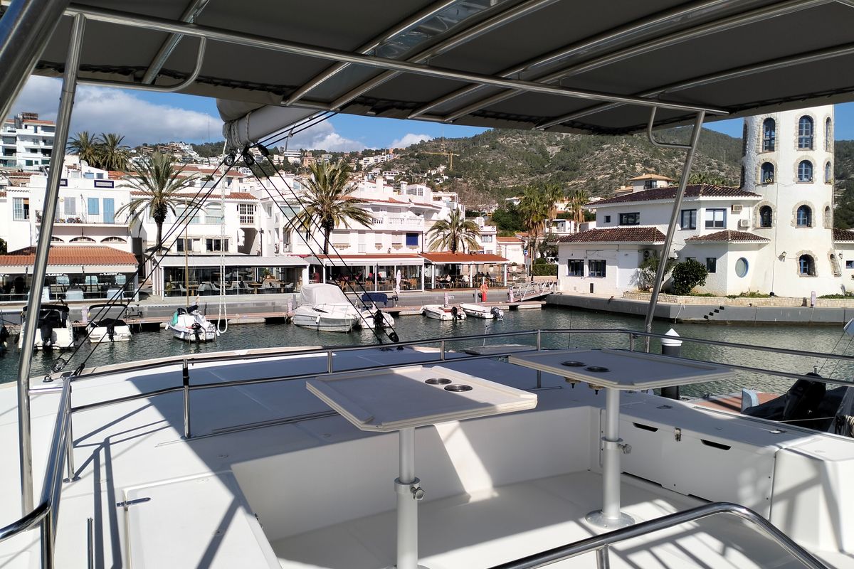 Deck of ONLY ONE LIFE, a Bali 5.4 catamaran at Sitges, Spain