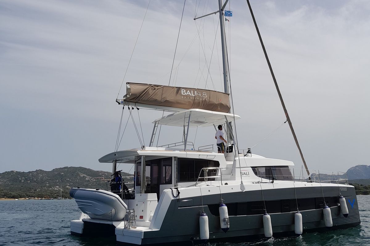 Exterior view of Physeter, a Bali 4.8 catamaran at Olbia, Italy