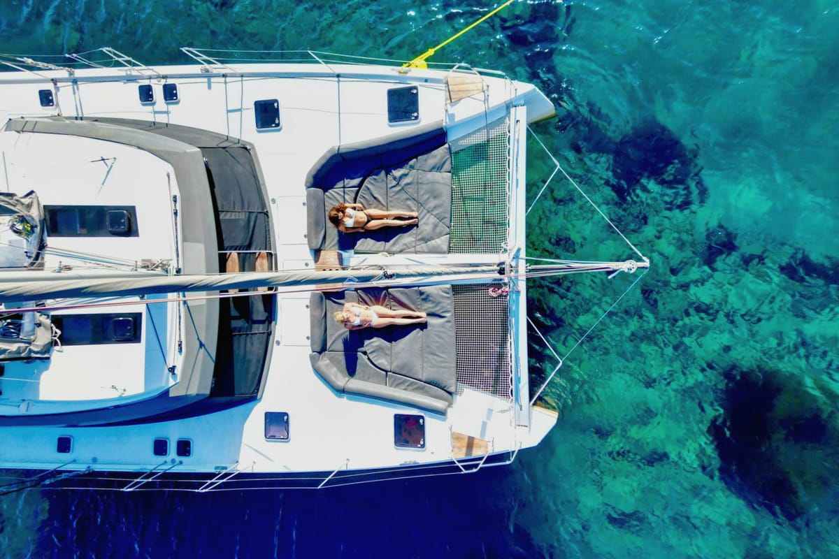 Exterior view of IQ, a Nautitech 46 Fly catamaran at Thira Municipal Unit, Greece