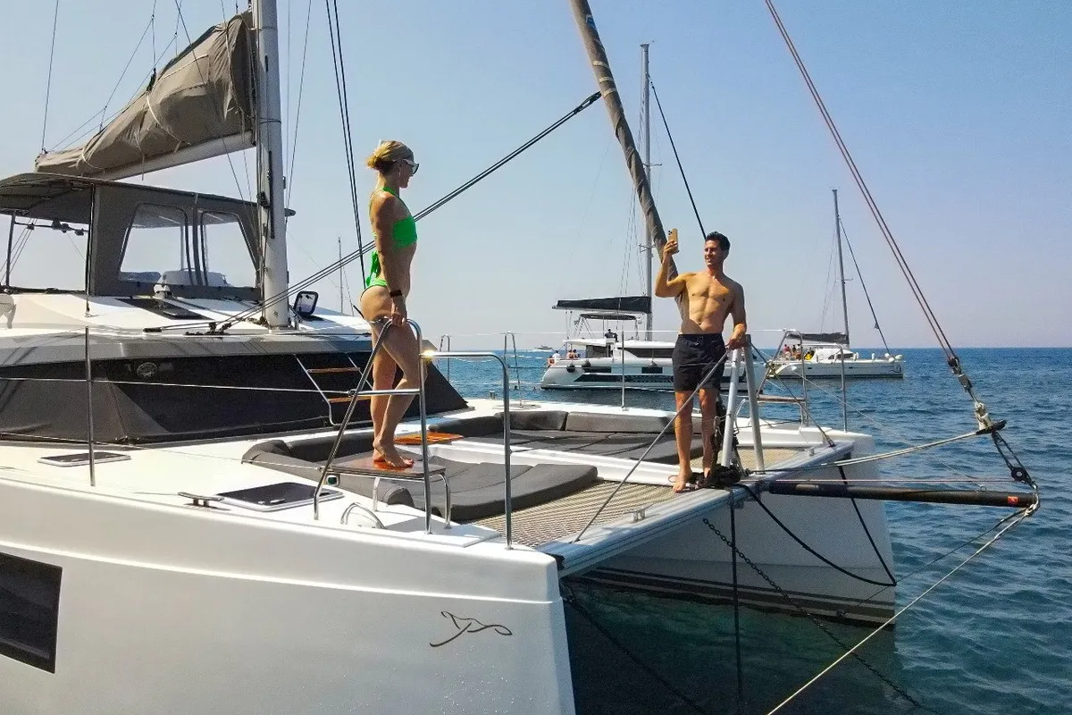 Exterior view of IQ, a Nautitech 46 Fly catamaran at Thira Municipal Unit, Greece