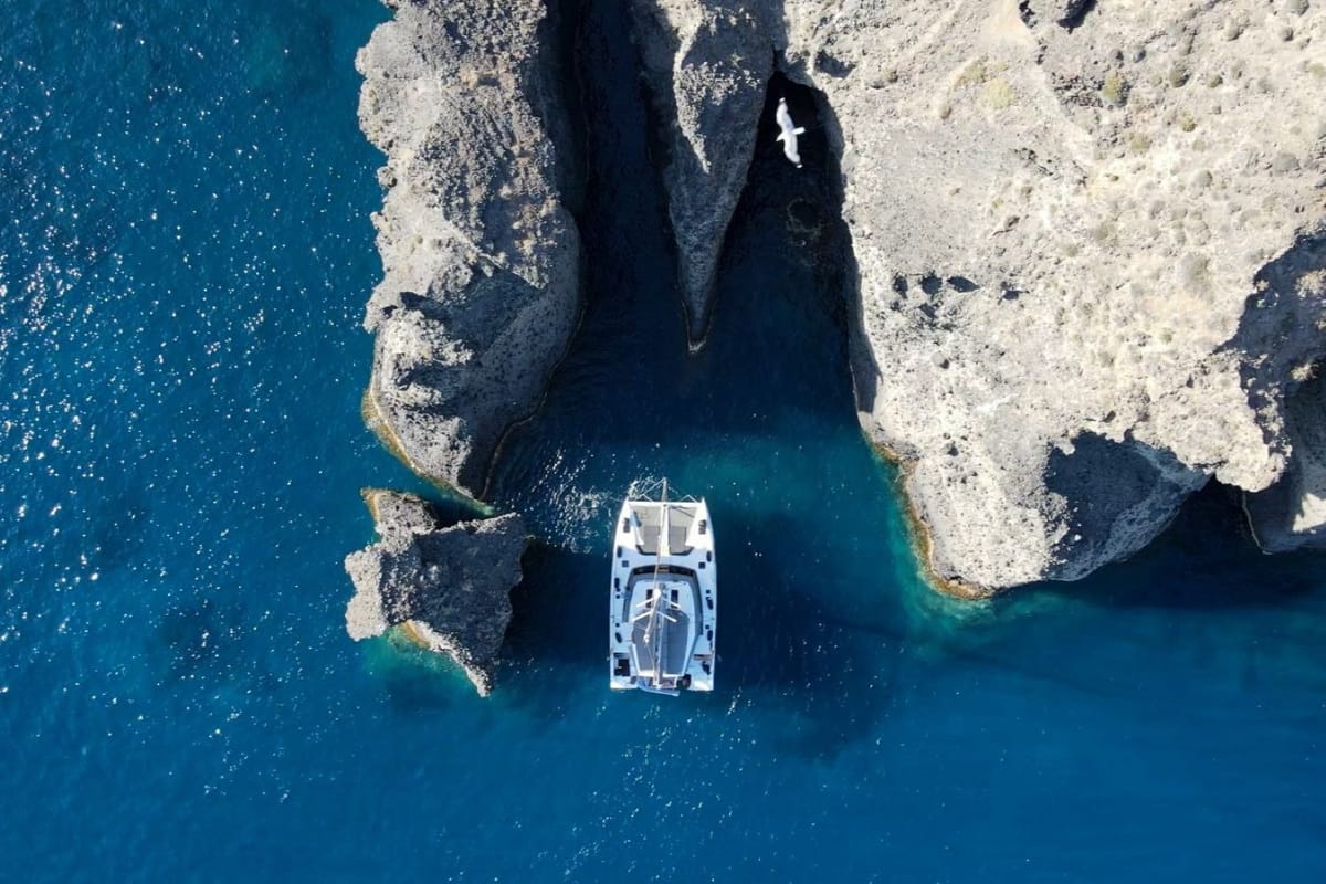 Exterior view of IQ, a Nautitech 46 Fly catamaran at Thira Municipal Unit, Greece