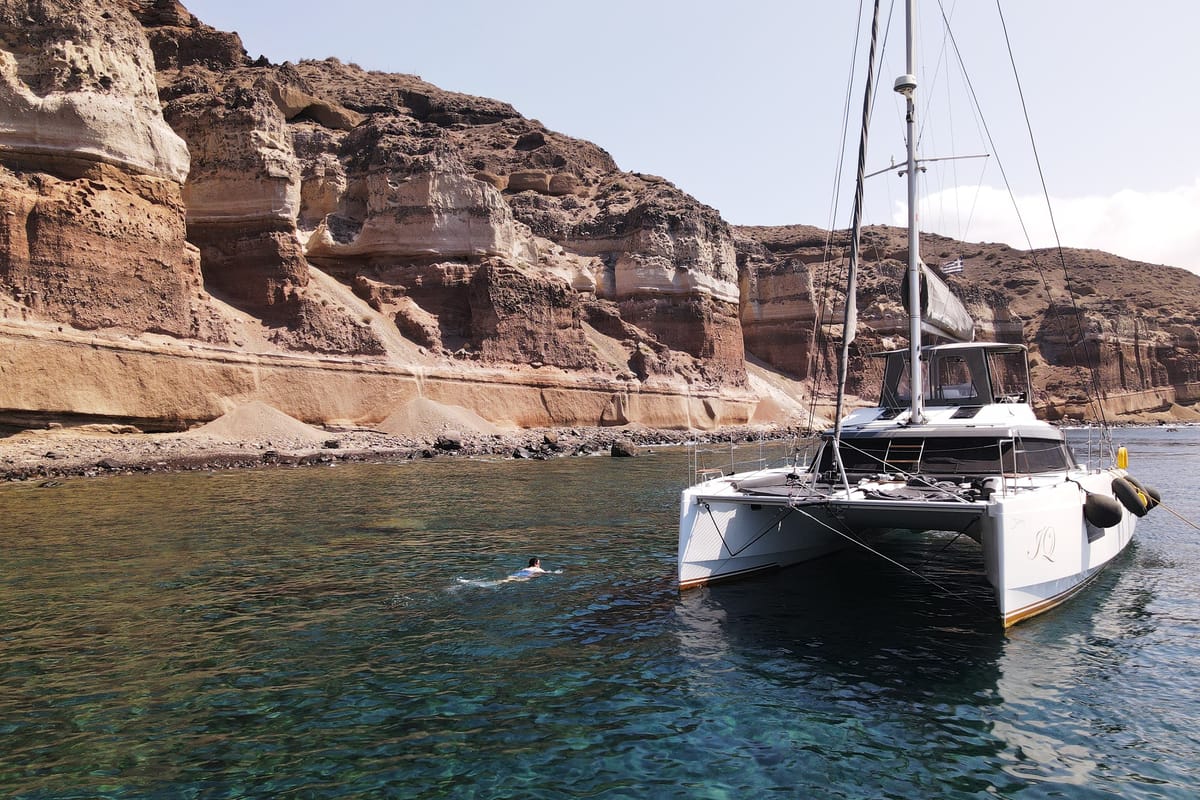 Exterior view of IQ, a Nautitech 46 Fly catamaran at Thira Municipal Unit, Greece