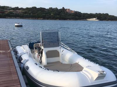 Exterior view of Cap 570, a Capelli Tempest 570 motorboat at Porto Cervo, Italy