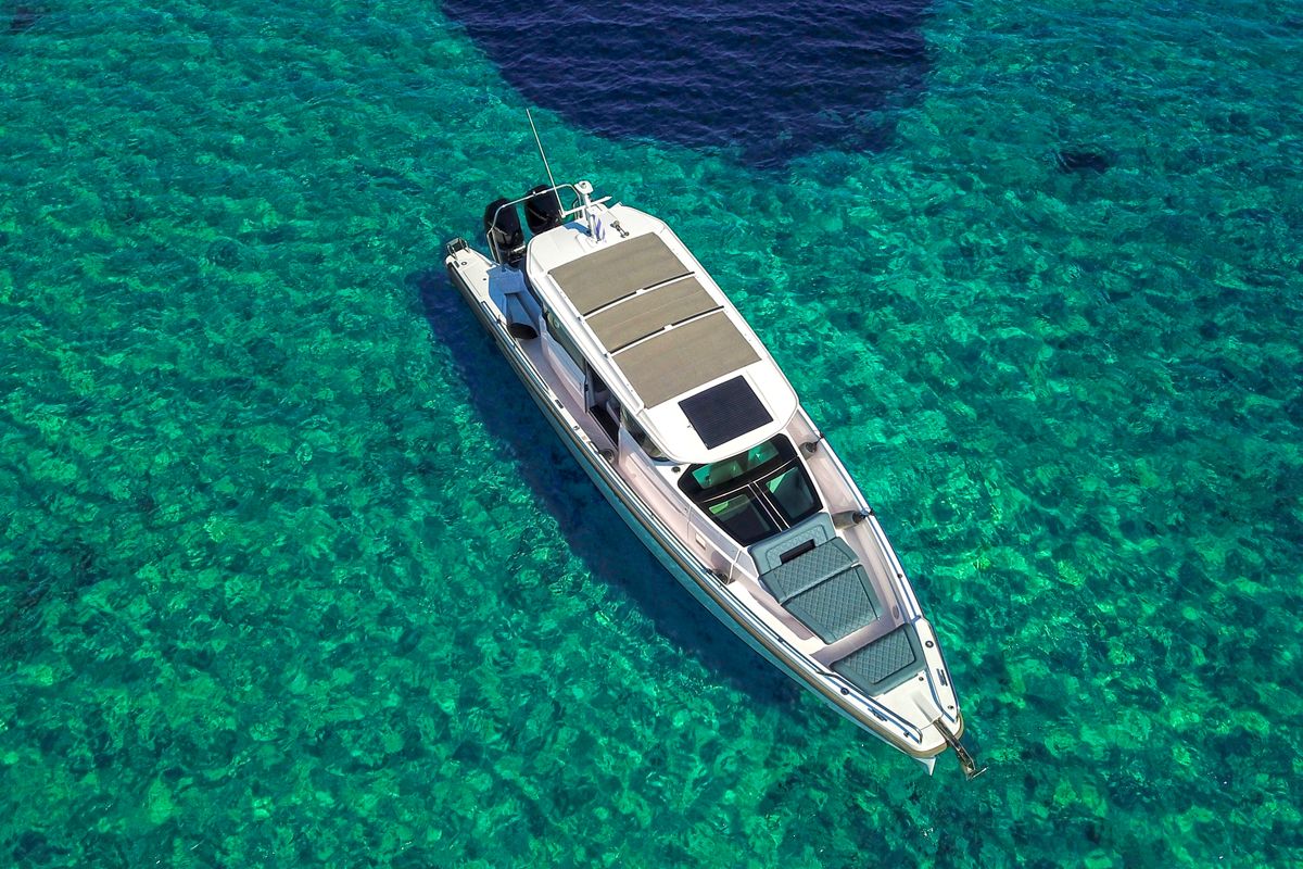 Exterior view of EVA II, a Axopar 37 XC Cross Cabin motorboat at Piraeus, Greece
