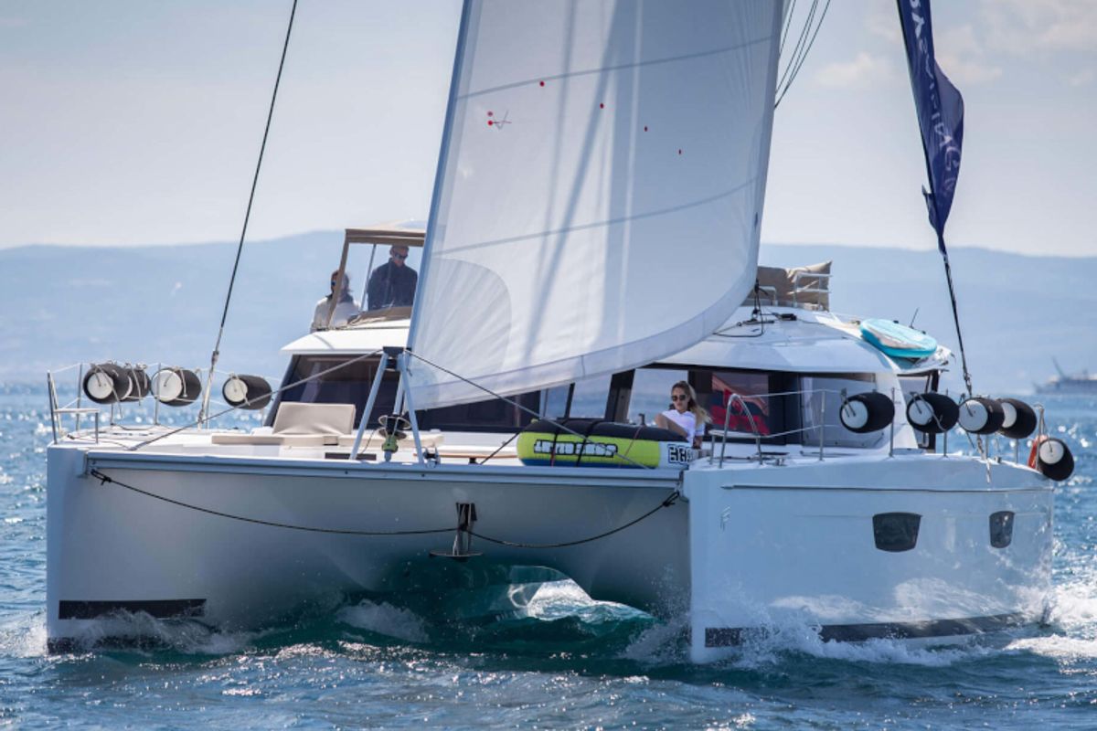 Exterior view of Princess Aphrodite, a Fountaine Pajot Saba 50 catamaran at Grad Trogir, Croatia