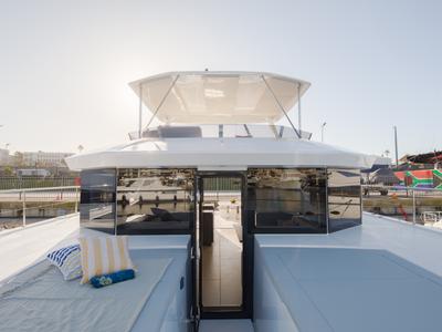 Deck of Leopard 53 PC Club, a Leopard 53 PC catamaran at Central Abaco, Bahamas