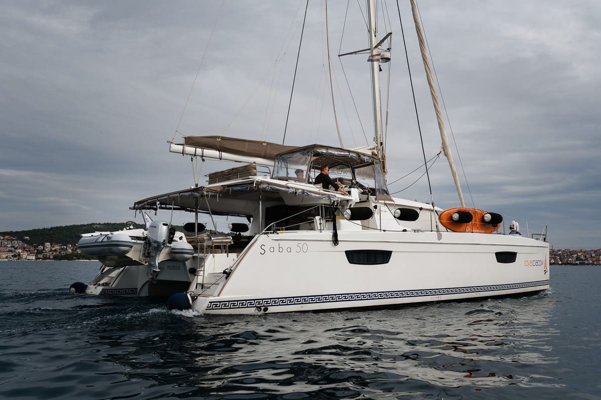 Exterior view of Royal Cracow, a Fountaine Pajot Saba 50 catamaran at Grad Trogir, Croatia
