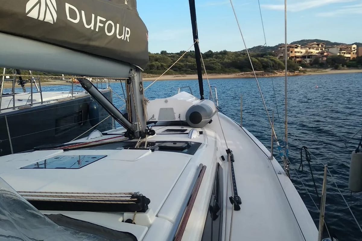 Exterior view of Thymus, a Dufour 430 sailboat at Olbia, Italy