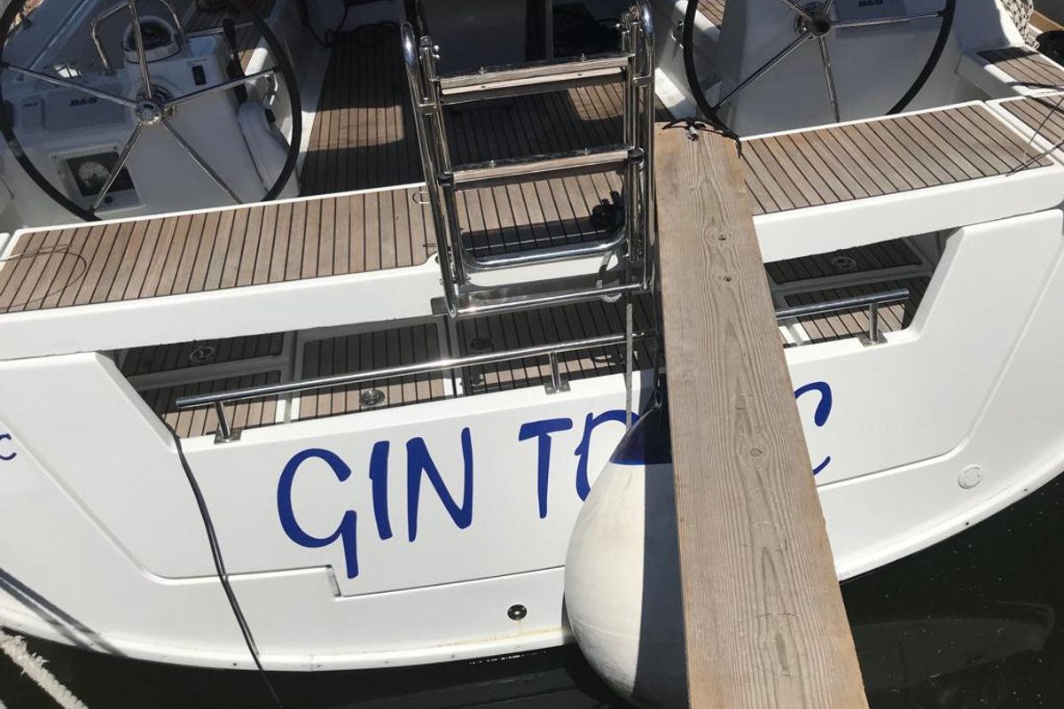Exterior view of Alboran Gin Tonic, a Beneteau Oceanis 45 sailboat at es Jonquet, Spain