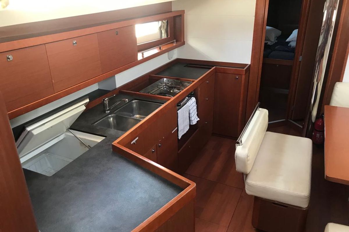Galley of Alboran Gin Tonic, a Beneteau Oceanis 45 sailboat at es Jonquet, Spain