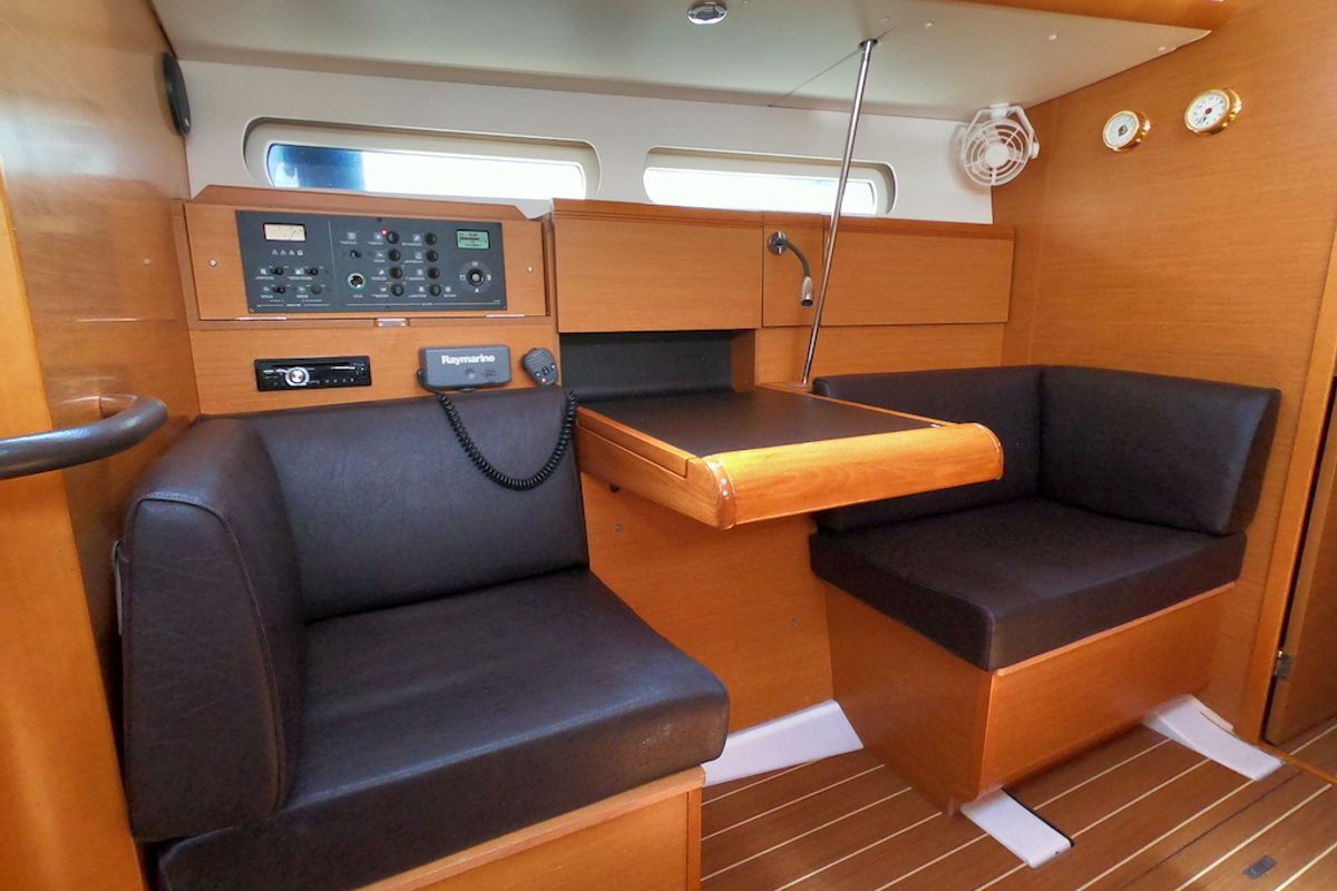 Salon of Piedanlo II, a Jeanneau Sun Odyssey 409 sailboat at Olbia, Italy