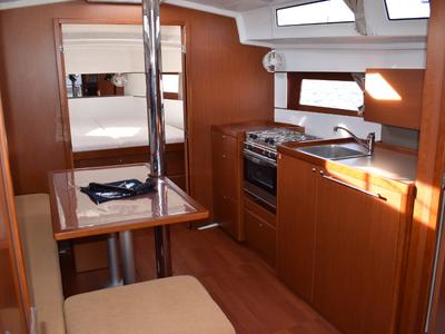 Salon of Ánemos, a Beneteau Oceanis 38 sailboat at U Pàize/Carloforte, Italy