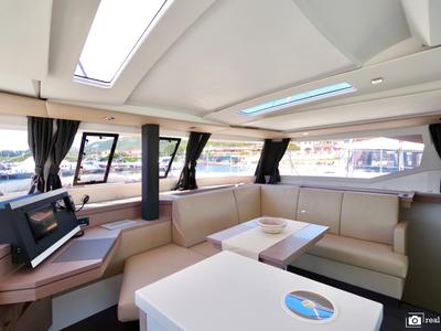 Salon of Orsa 3, a Fountaine Pajot Saona 47 Quintet catamaran at Cannigione, Italy