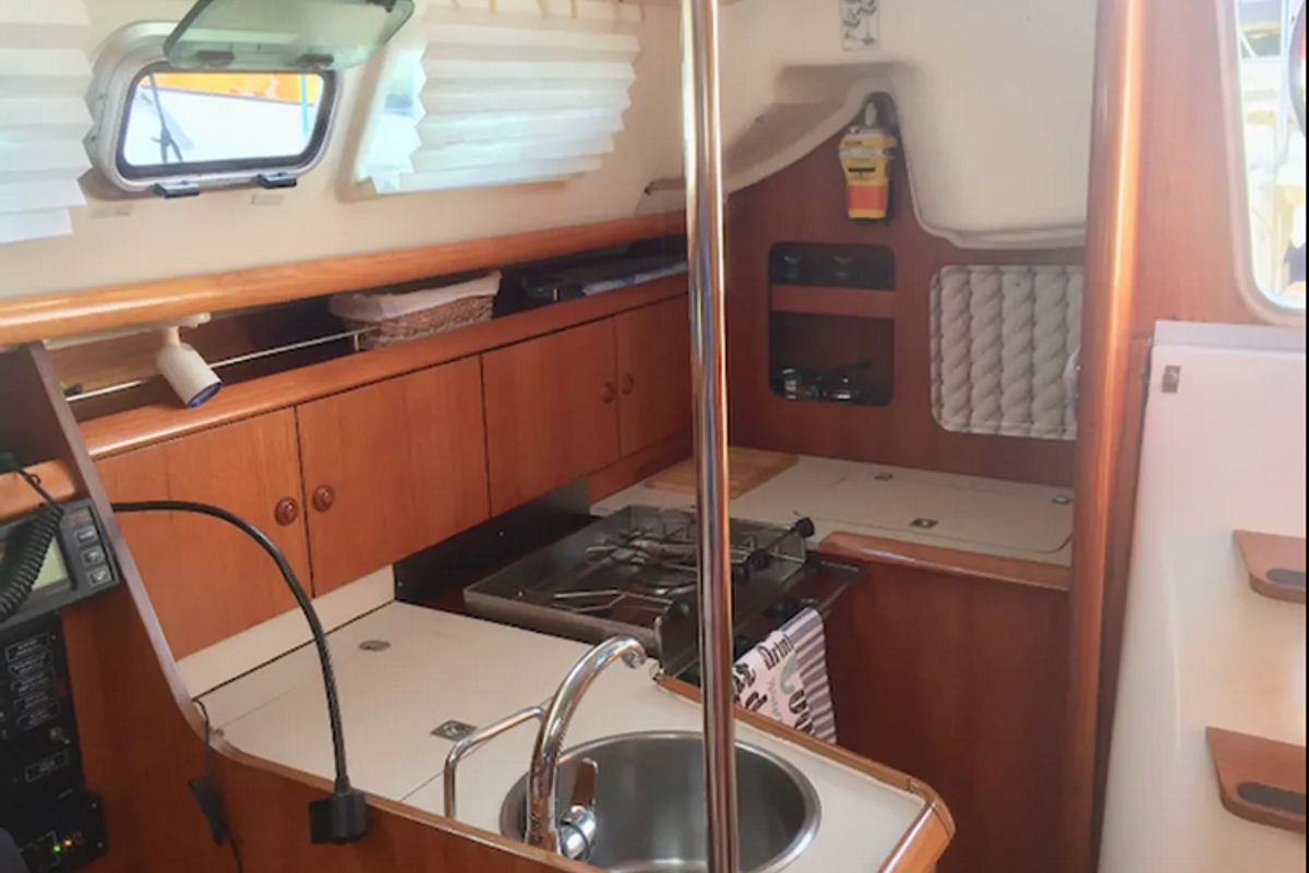 Galley of Iason, a Jeanneau Sun Odyssey 32 sailboat at Kontokali, Greece