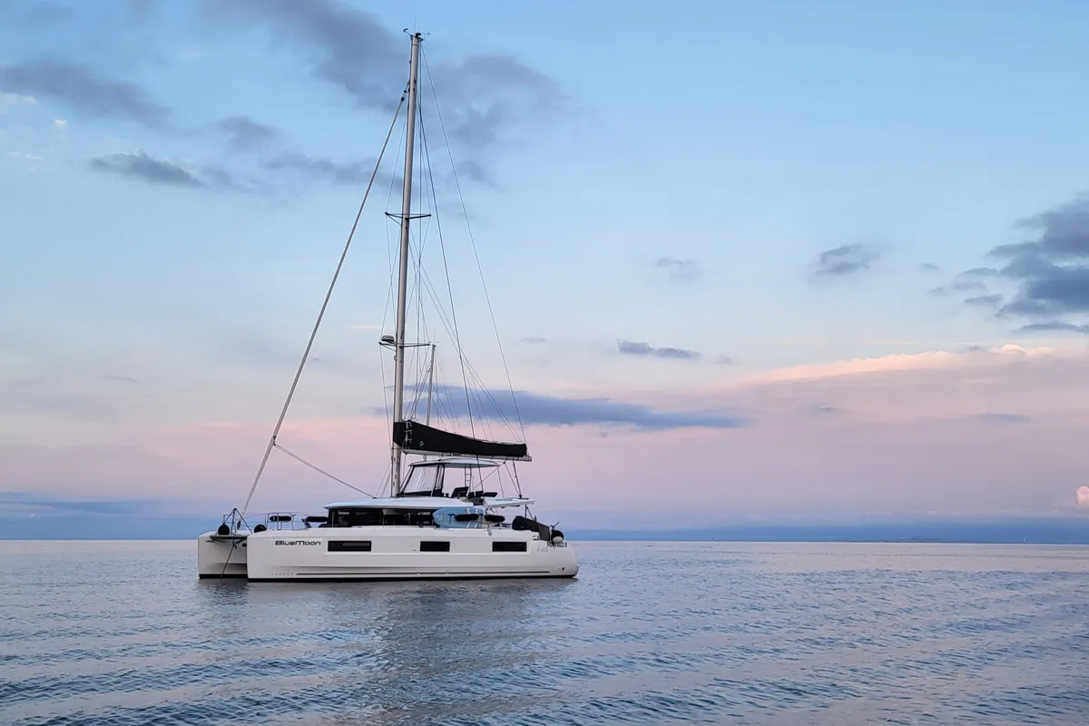 Exterior view of Blue Moon, a Lagoon 46 catamaran at Capo d'Orlando, Italy