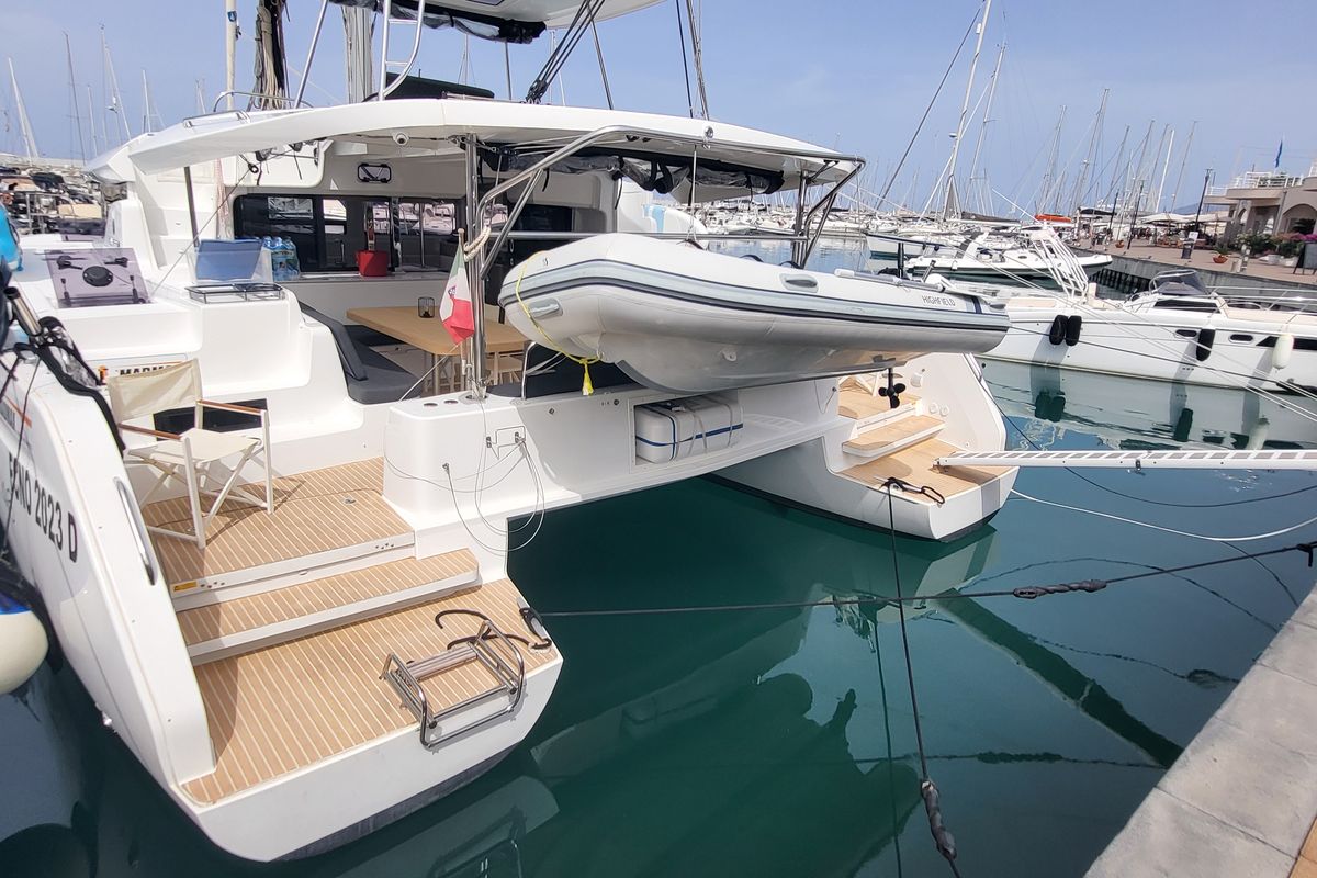 Exterior view of Blue Moon, a Lagoon 46 catamaran at Capo d'Orlando, Italy