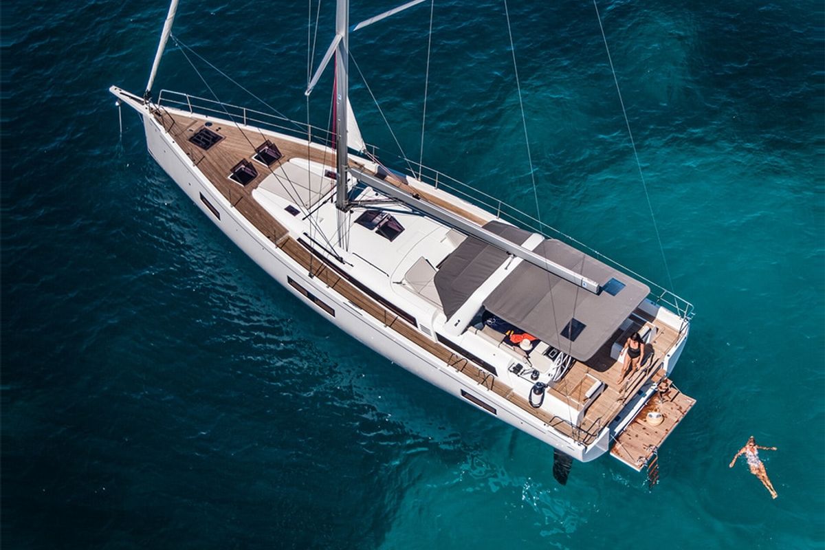 Exterior view of Philia, a Beneteau Oceanis 54 sailboat at es Jonquet, Spain