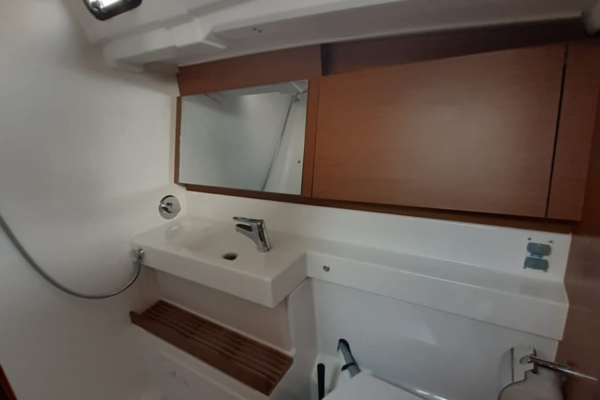 Head on White Pearl, a Jeanneau Sun Odyssey 490 sailboat at Kontokali, Greece