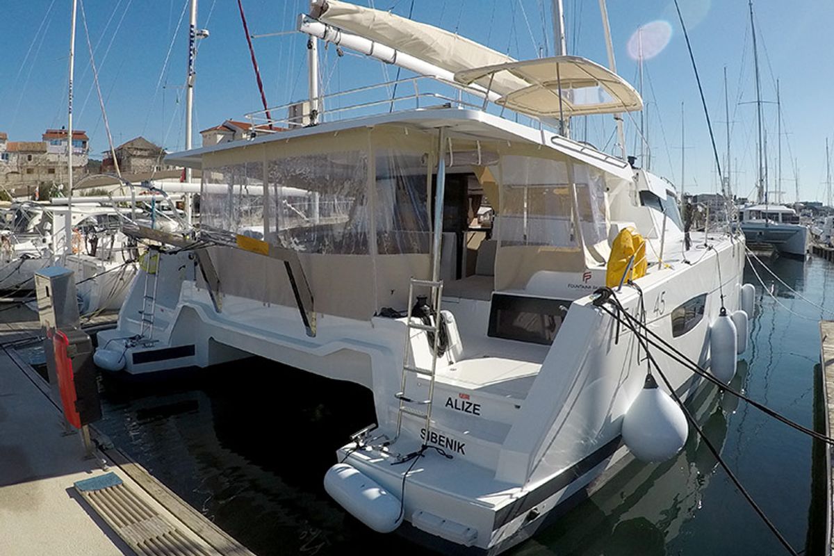 Exterior view of Alize, a Fountaine Pajot Elba 45 catamaran at Grad Šibenik, Croatia