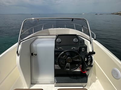 Cockpit of Firulais, a Quicksilver Activ 675 Open motorboat at Roses, Spain