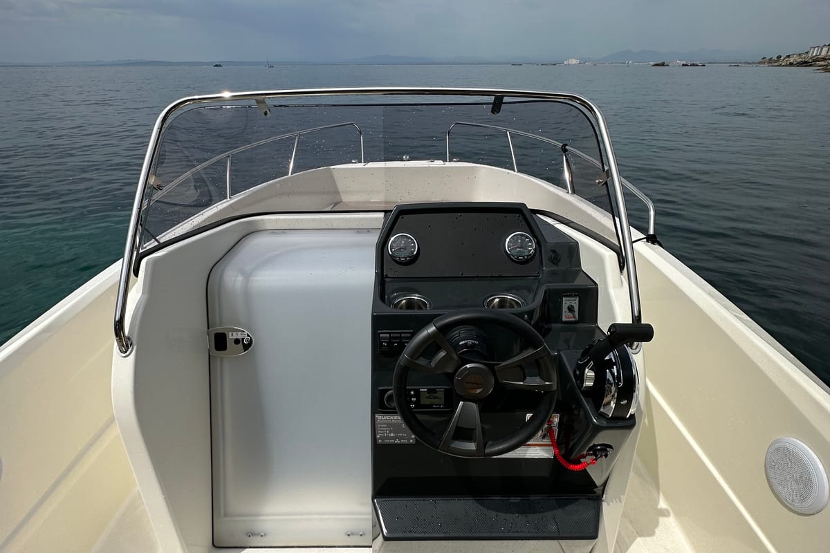 Cockpit of Firulais, a Quicksilver Activ 675 Open motorboat at Roses, Spain