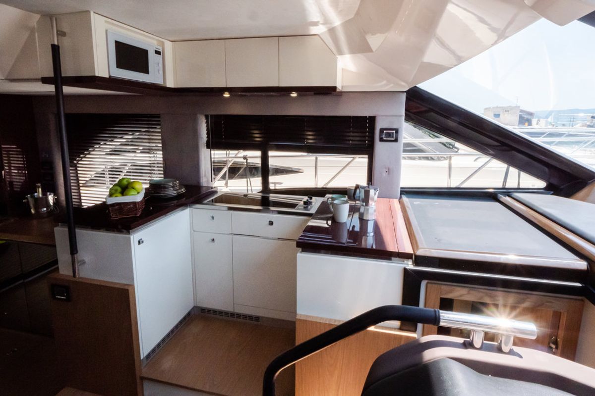 Galley of Stardust, a Sessa Marine Sessa Fly 47 yacht at Općina Sukošan, Croatia
