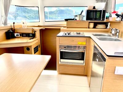 Galley of ONE Ibiza BAREBOAT, a Excess 11 catamaran at Ibiza, Spain
