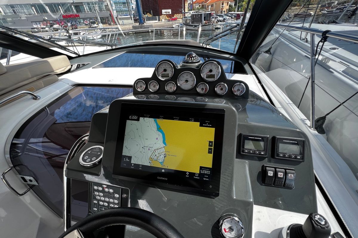 Cockpit of Rio, a Bavaria 33 Sport HT motorboat at Grad Biograd na Moru, Croatia