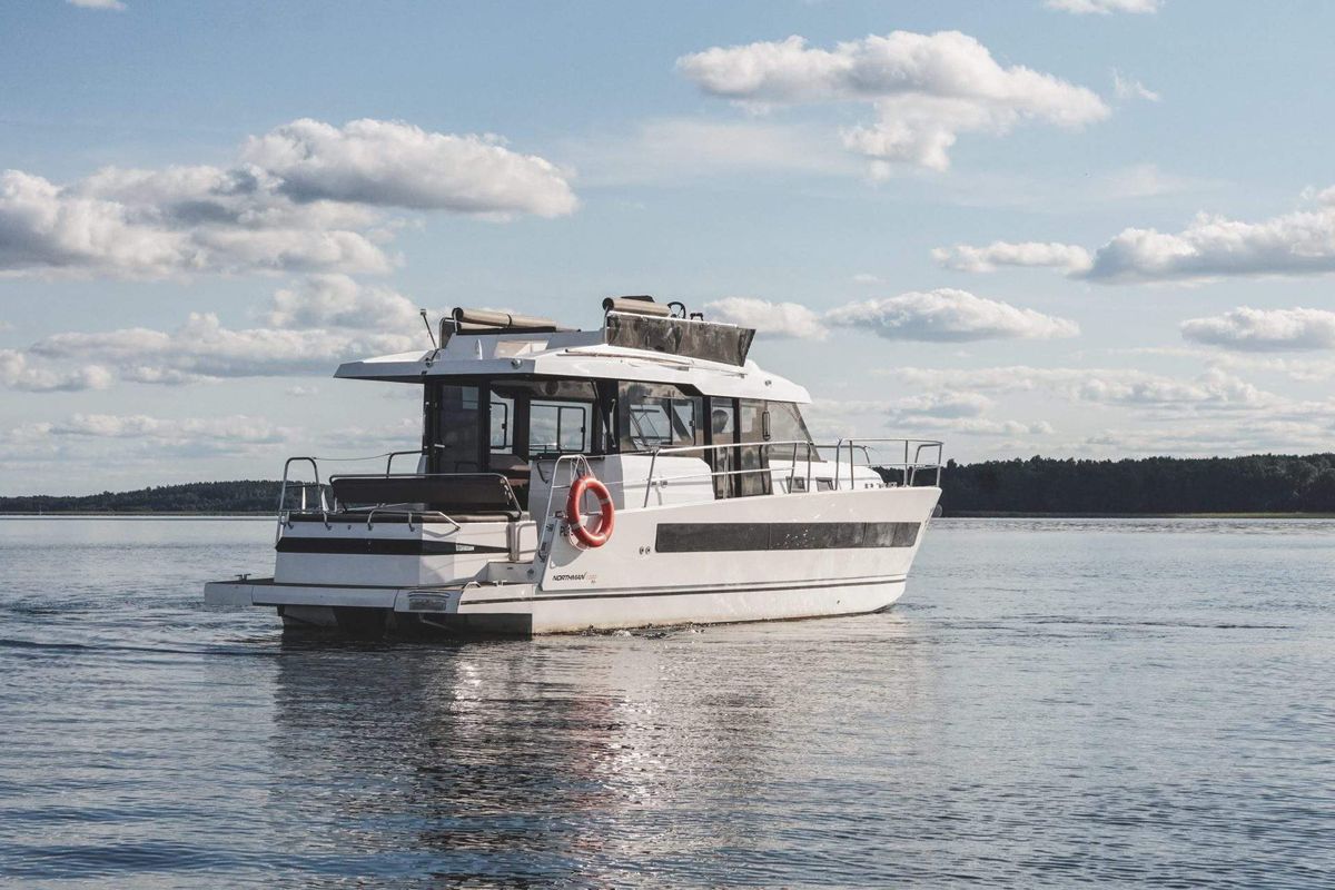 Exterior view of Sirina, a Northman 1200 motorboat at Sztynort, Poland