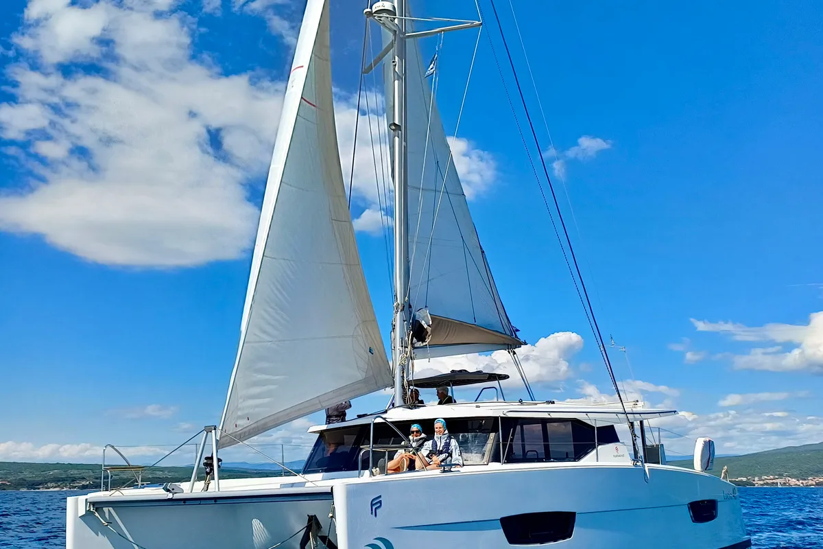 Exterior view of Stella Luna, a Fountaine Pajot Lucia 40 catamaran at Punat, Croatia