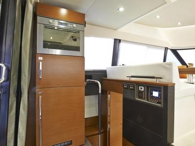 Galley of Beni, a Prestige 450 motorboat at Giardini Naxos, Italy