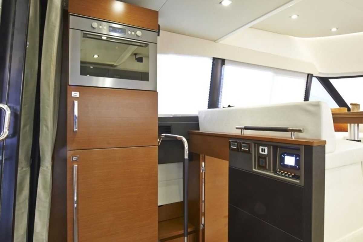 Galley of Beni, a Prestige 450 motorboat at Giardini Naxos, Italy