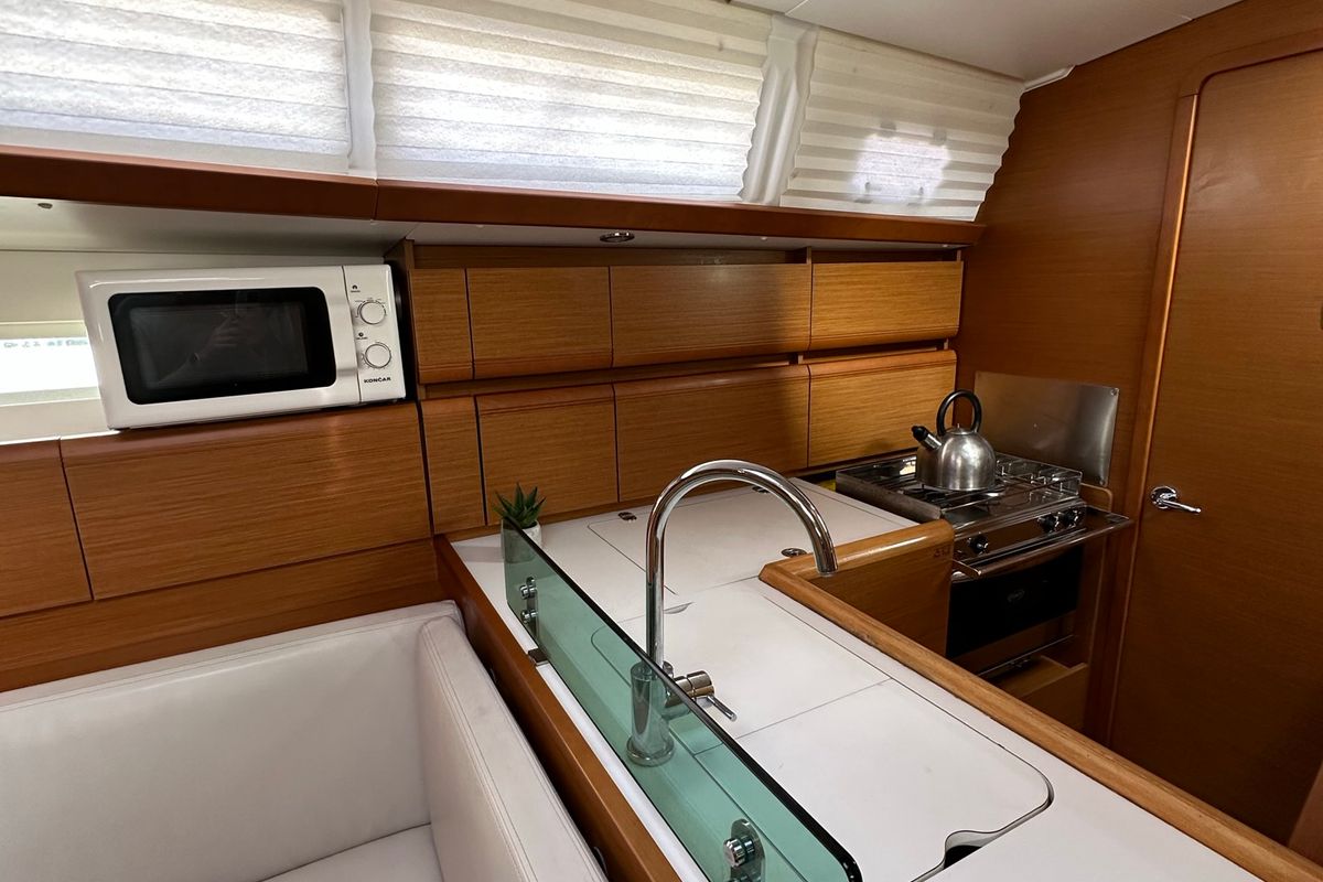Galley of Alboran XXXIV Nini, a Jeanneau Sun Odyssey 389 sailboat at Općina Pakoštane, Croatia
