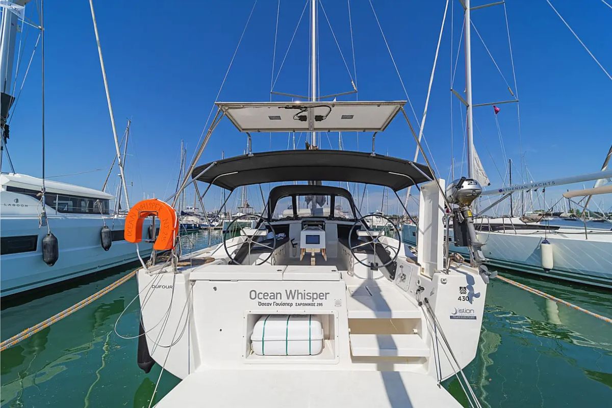 Exterior view of Ocean Whisper, a Dufour 430 sailboat at Port of Avdira, Greece