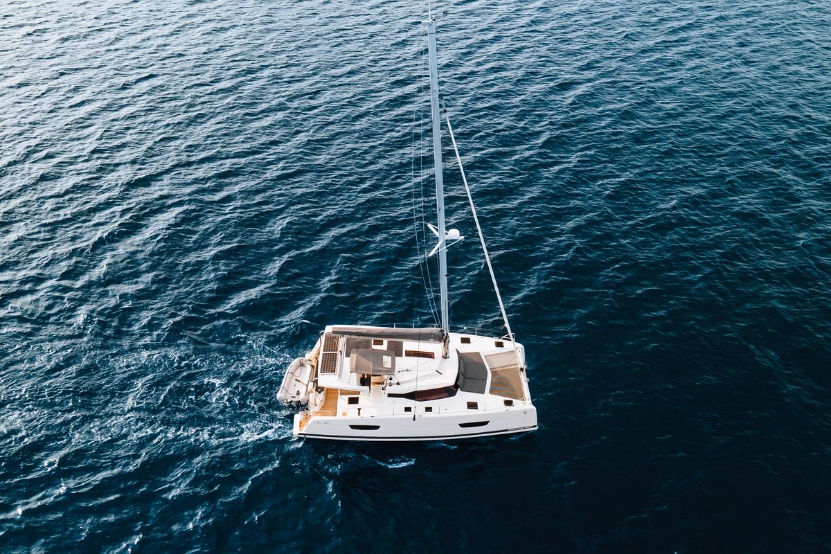Exterior view of Carpe Vitam, a Fountaine Pajot Isla 40 catamaran at Lavreotiki Municipal Unit, Greece