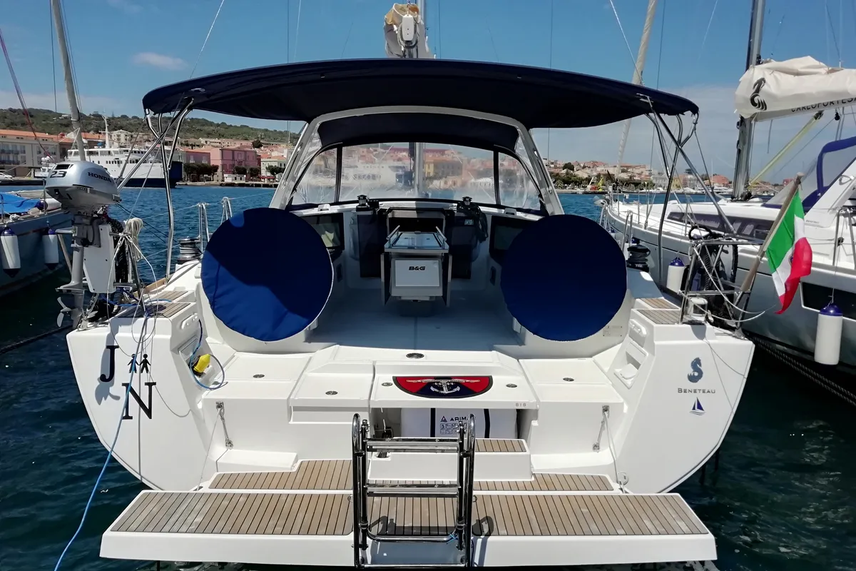 Exterior view of JN, a Beneteau Oceanis 45 sailboat at U Pàize/Carloforte, Italy