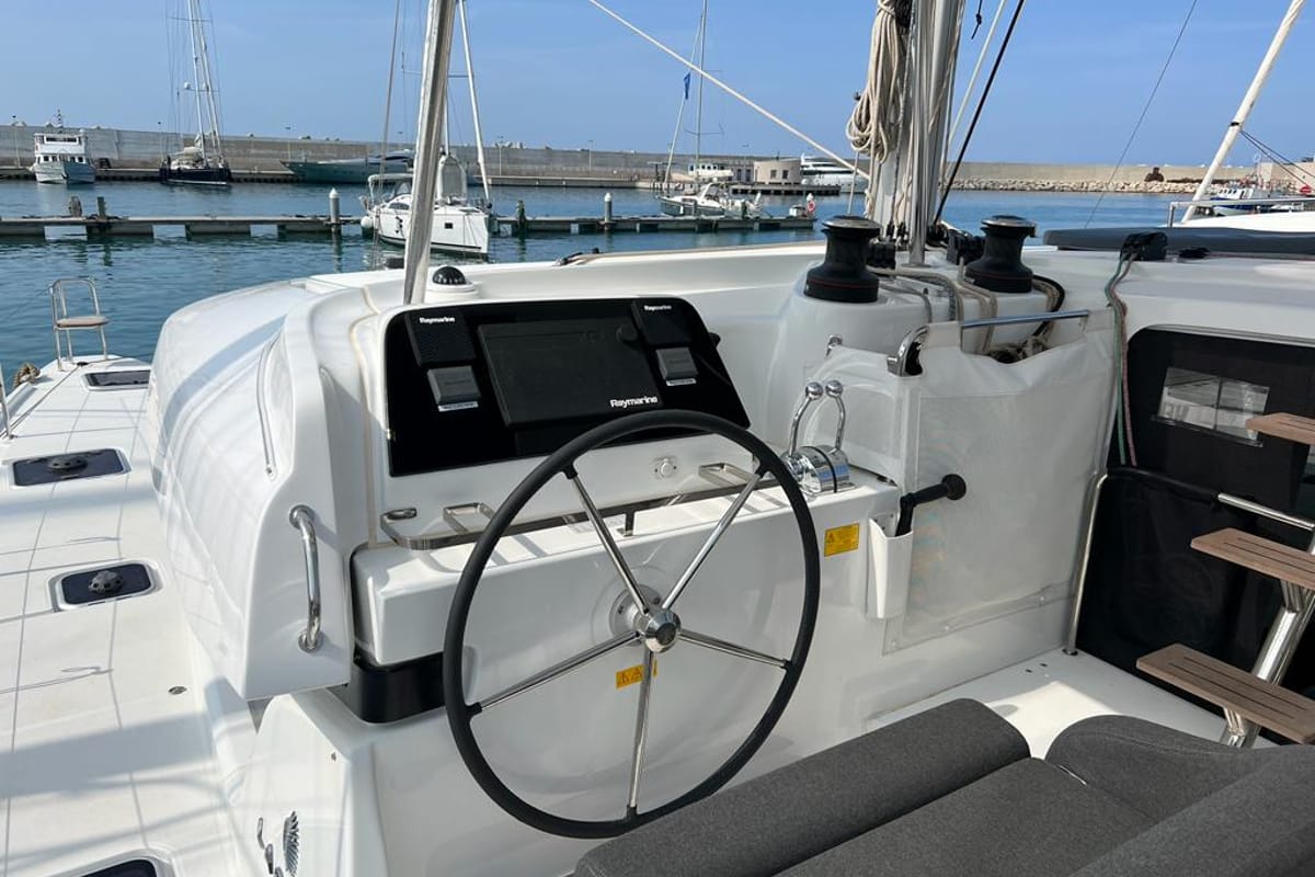 Cockpit of Sissi, a Lagoon 42 catamaran at Capo d'Orlando, Italy